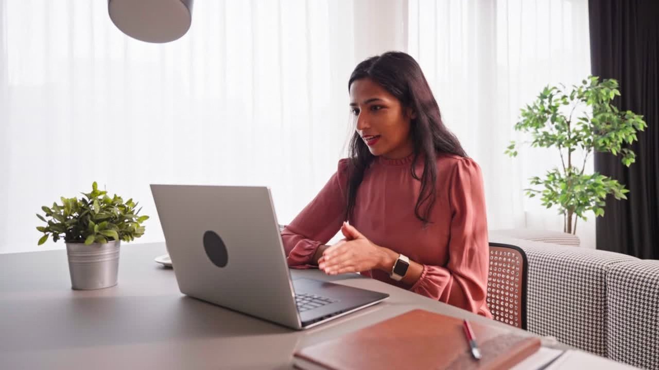 Designer researching products on a laptop